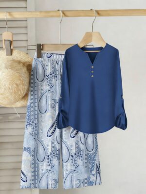 Spring And Autumn Women'S Suit Sets. A Solid V-Neck T-Shirt with Button Details Paired with Wide-Leg Pants Featuring Ethnic Prints. This Two-Piece Outfit Is Perfect for Everyday Use, Travel, And Work Commutes. Stylish Women'S Apparel