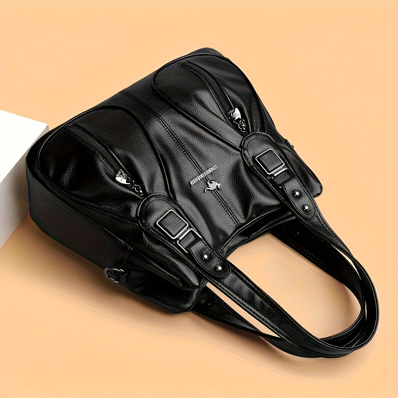 A Stylish Women'S Handbag with a Touch of Luxury, Featuring Fashionable Studs And Metal Fasteners. Its Multi-Pocket Design Ensures Organized Storage, And The Adjustable Shoulder Strap Allows for Versatile Carrying Options - Image 8