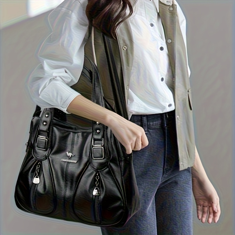 A Stylish Women'S Handbag with a Touch of Luxury, Featuring Fashionable Studs And Metal Fasteners. Its Multi-Pocket Design Ensures Organized Storage, And The Adjustable Shoulder Strap Allows for Versatile Carrying Options - Image 9